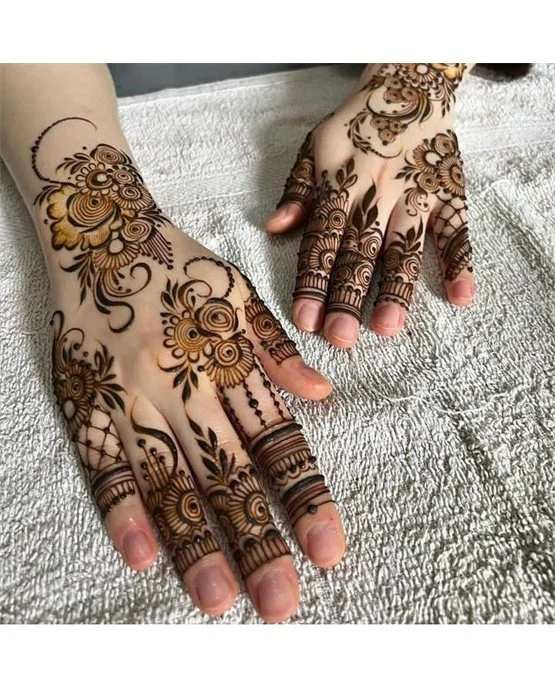 Unique Detailing Blending Into Highlight Back Hand Mehndi Design